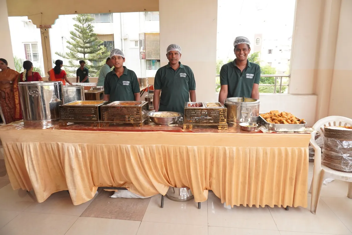 Aadhya catering team at the live food counter